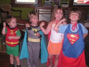 kids pretending to be superheroes