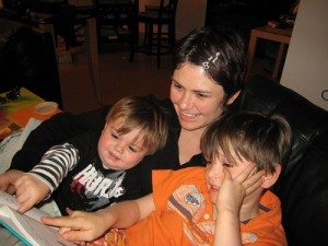 mother reading to kids