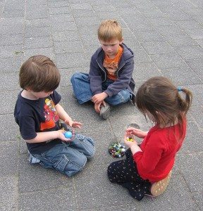 kids playing marbles