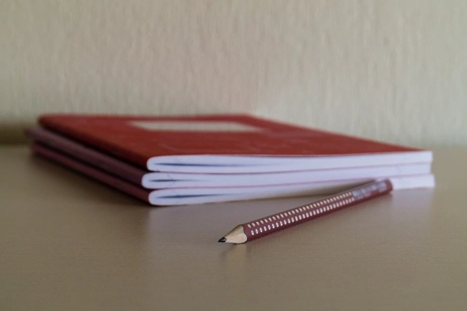 notebooks and pencil