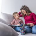 mother and son reading a picture book