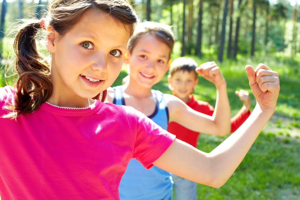 kids flexing muscles